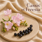 Fondant parfumé Cassis et Freesia alvea, présenté dans une ambiance fruitée.