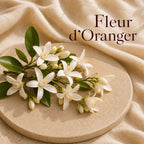 Fondant parfumé Fleur d'Oranger alvea, présenté dans une ambiance florale.